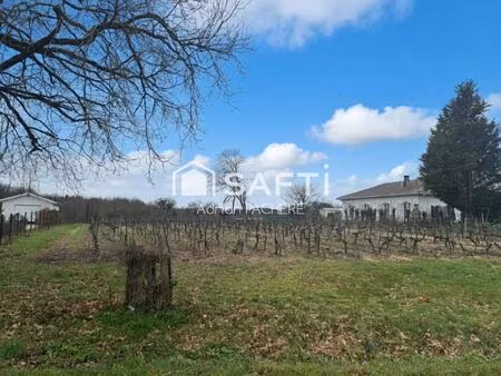 au cœur du médoc  entre vignes et estuaire  ce terrain constructible vous offre le cadre i