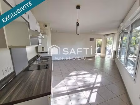 appartement t2 balcon + place parking sécurisée