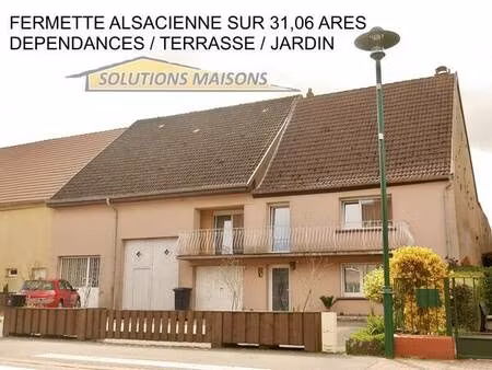 fermette alsacienne avec dependances sur 31 06 ares de terrain