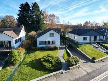 maison individuelle avec 4 façades et beaucoup d'espace