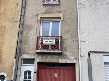 maison en cœur de ville avec cour et garage