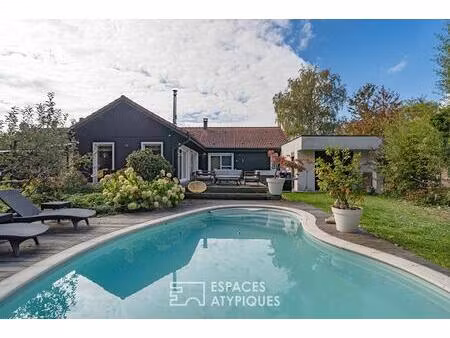 maison familiale chaleureuse et son jardin intimiste