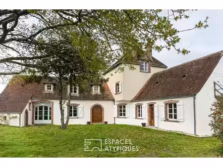 grande maison de campagne à fort potentiel dans un cadre verdoyant