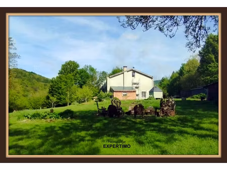 grande maison atypique avec 5772 m² de terrain attenant