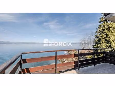 bien d’exception – t2 de 48 m² avec vue panoramique sur le lac  balcon et stationnement pr