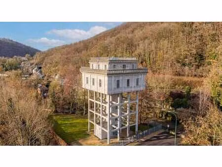 ancien filtre à eau transformé en loft à marchin!