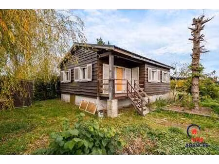 maison 4 façades sur une parcelle de 5 ares