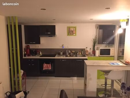 t2 rez de jardin dans maison de 4 logements