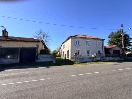 maison 6 pièces (194m2 habitable) avec terrain divisible et garage aménageable dans la cen
