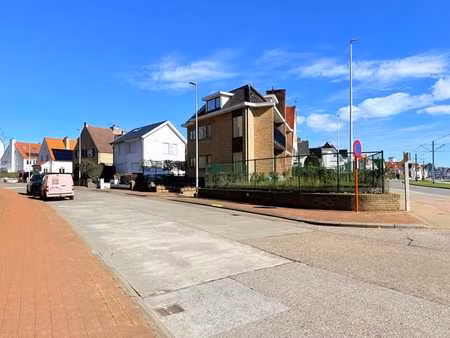 koppelvilla met 4-slaapkamers en tuin nabij het strand va...