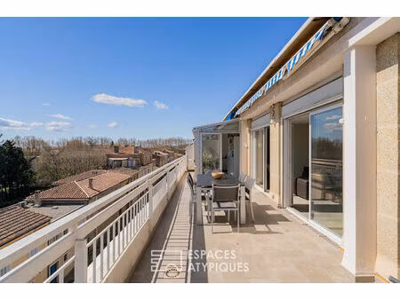 rooftop d'exception au dernier etage avec vue sur les toits