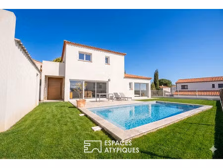 villa récente avec jardin  un écrin récent aux accents de pierre a proximité de perpignan
