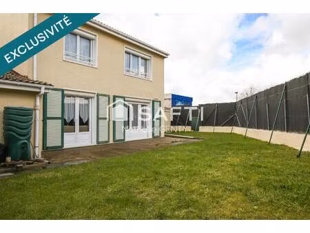 maison avec jardin et garage dans quartier recherché de petite-synthe