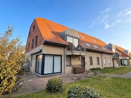 duplex appartement met ondergrondse parking nabij het strand