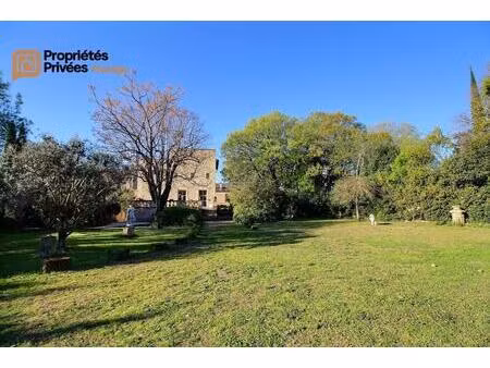 uzes propriété d'exception en pierre au coeur d'uzès  dans un écrin de verdure de 2 195 m²