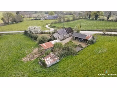 ancien corps de ferme sur plus de 7 hectares de terres à st denis de gastines