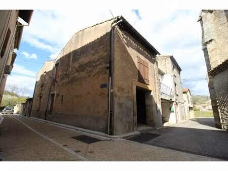 a vendre un garage sur deux niveaux idéalement placé