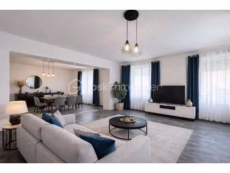 duplex 125 m² – 2 chambres + 1 bureau – jardin  cave et stationnement – faibles charges