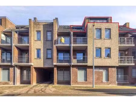 lichtrijk 2 slaapkamer appartement met garage te handzame...