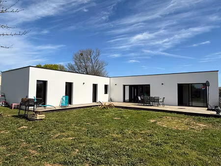 maison toit plat - belle parcelle