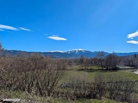 terrain 1015 m² enveitg