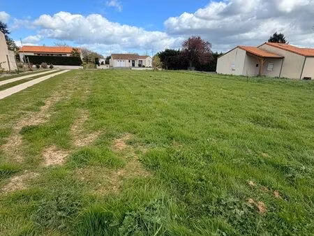 terrain 655 m² plat  à deux pas du centre