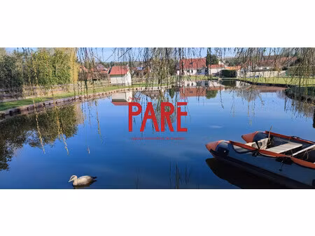 propriété avec etang poissonneux