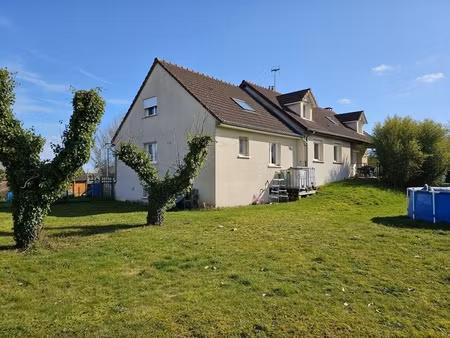 deux maisons  un terrain  un potentiel unique : vivre ensemble ou séparer les espaces à vo