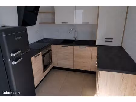 appartement f2 avec garage cave et place privative