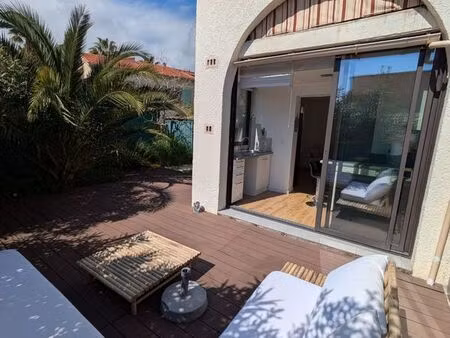 deux-pièces avec terrasse et jardin  au calme