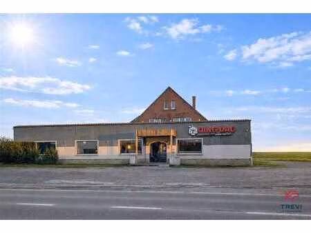 immeuble à usage mixte : restaurant/commerce et habitation