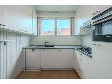 woning met garage en zuidgerichte tuin met enorm veel mog...