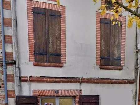 immeuble avec local commercial en rez-de-chaussée