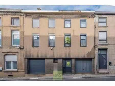 maison 2 façades  6 chambres  jardin et garage.