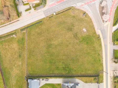 ruime bouwgrond van 18 are in groene omgeving te rijmenam