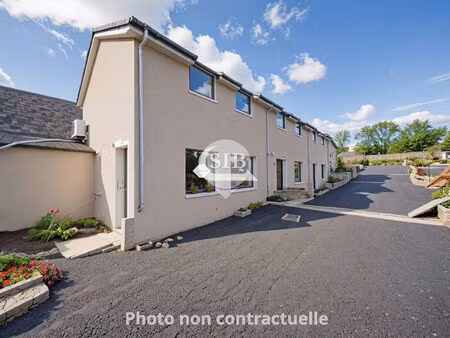maison de ville état neuf avec jardinet.