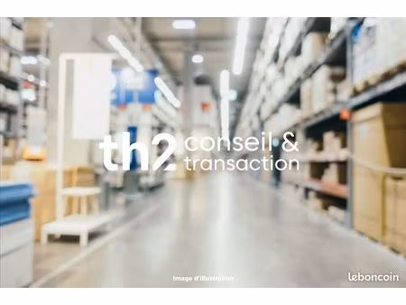 local 2000 m² carpiquet