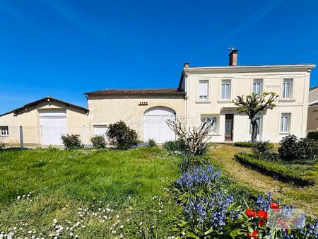 magnifique propriété en pierre offrant un potentiel de reven