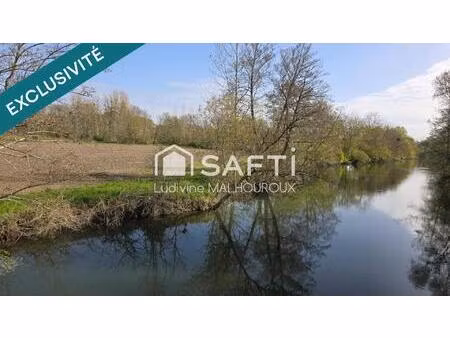 terrain de loisirs d’environ 1000 m² avec accès direct à la rivière la dronne  sera borner