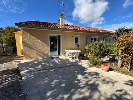 maison avec jardin   garage et un atelier  des commodités juste à pied !
