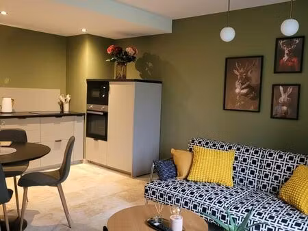 f2 de plain pied avec jardin et garage