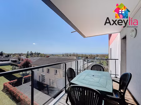 a vendre - feurs - appartement avec balcon et garage ferme