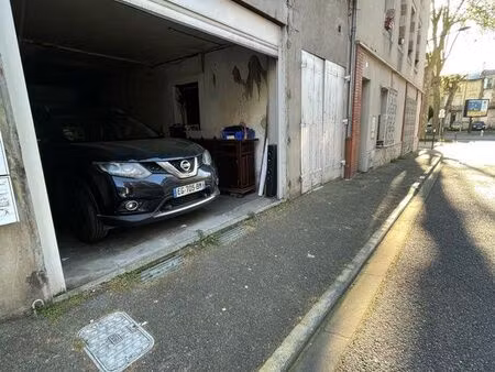 grand garage + cave centre-ville d’agen