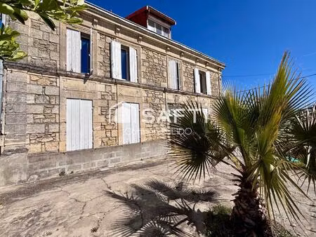 investissement locatif : 3 appartements de type : t4 en rez de chaussé  et 2x t3 à l'étage