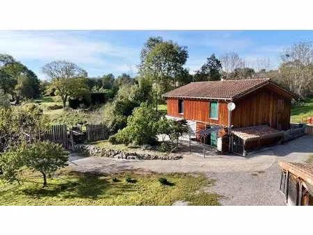 maison ossature bois avec jardin
