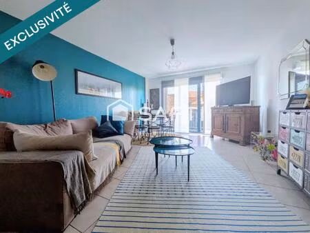 appartement t3 avec un balcon et 2 places de parking privatives