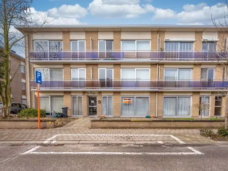 gelijkvloers appartement met 2 slaapkamers  tuin/terras en garagebox!