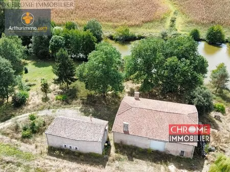 maison en pierre + dépendance de 250m² avec vue sur étang