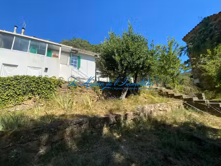 a 5 minutes d'anduze  maison de f3 avec véranda au calme sur 1434 m2 de terrain