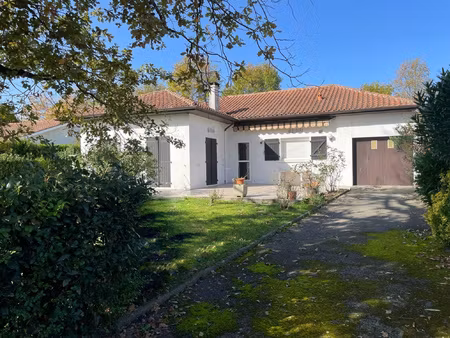 maison de plain-pied avec garage et jardin de 700m2